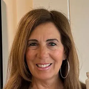 Woman holding Derma Essential